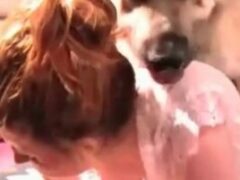 Mature woman having sex with two cocky dogs