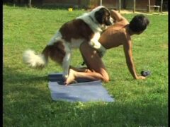 Gay man crying in the garden during anal with dog
