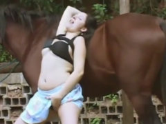 Woman makes homemade video making love with the horse